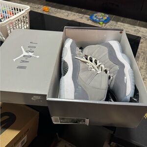 Size 7Y. Women’s 8.5. Jordan Cool grey 11s. Worn maybe twice. Comes with box!